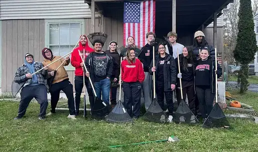NCAA Volunteering Athletes pose for group photo