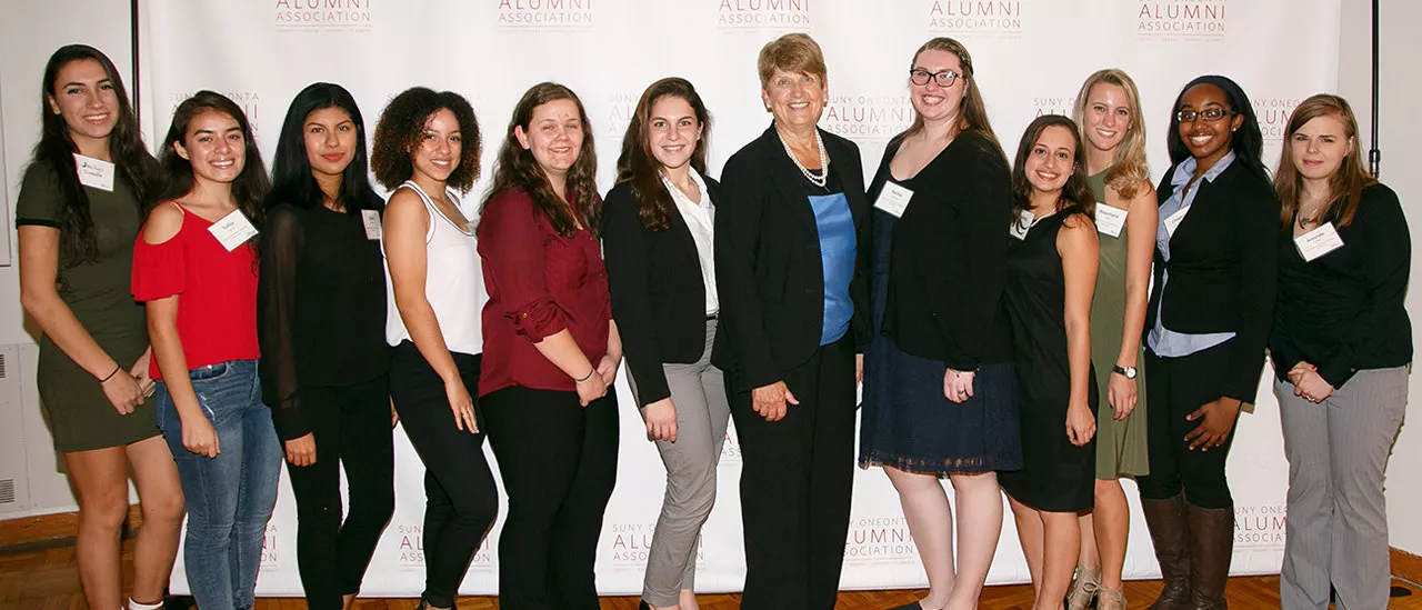 Janet Perna with scholarship recipients