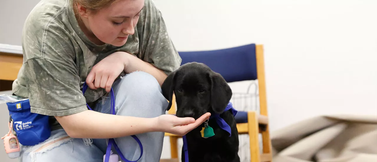 Student with Puppy