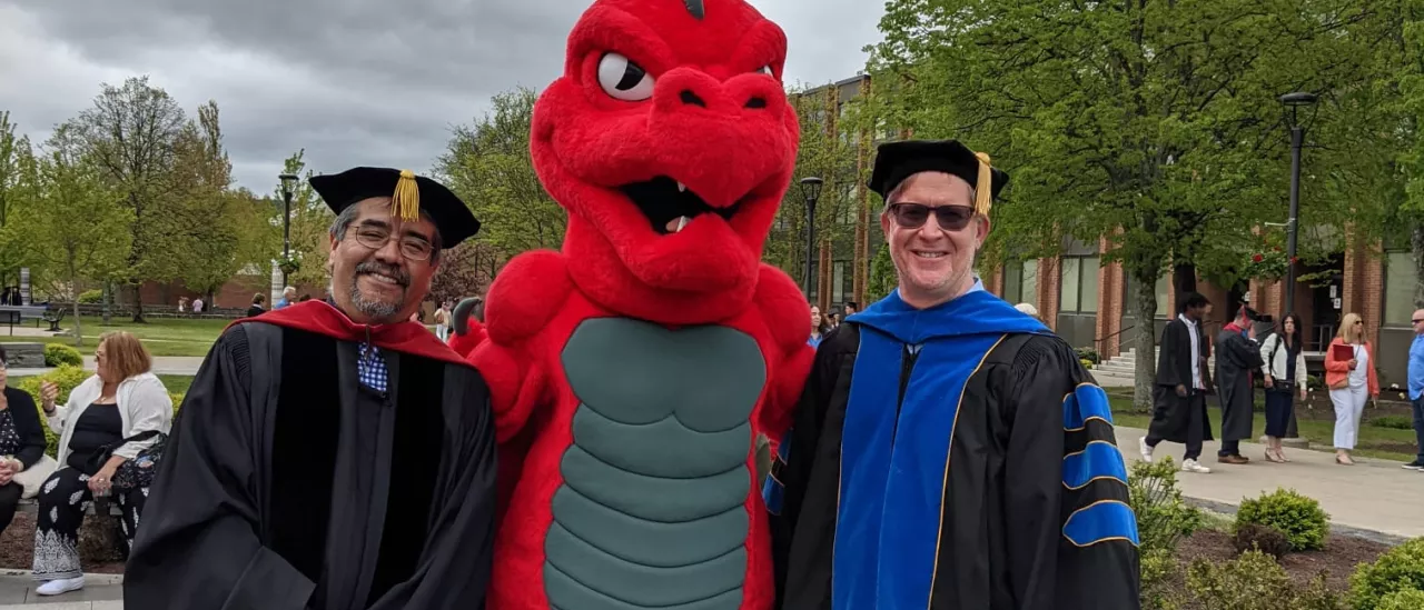 Dr. Leon and Dr. Hendley with the Red Dragon mascot
