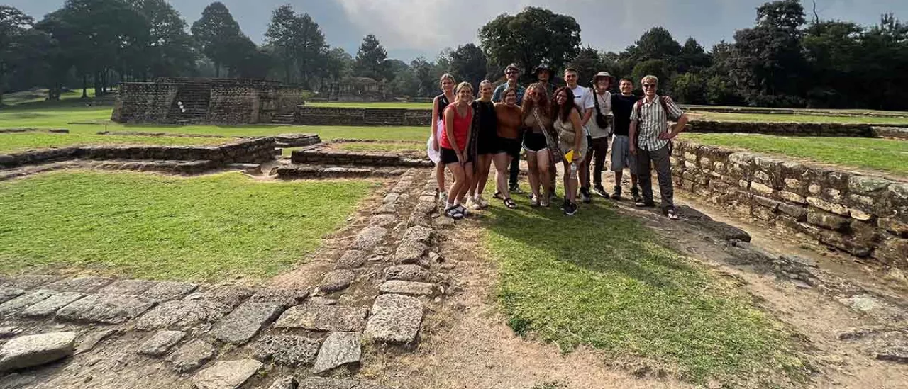 Guatemala trip students near ancient ruins