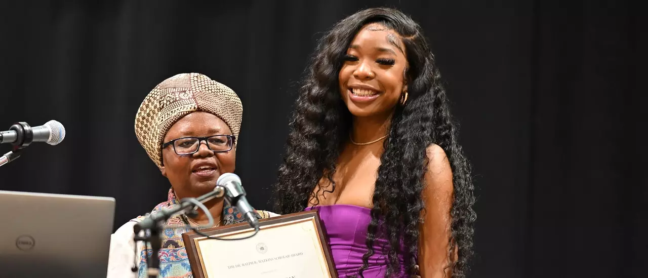 Student receiving the Dr. Ralph Watkins Scholar Award