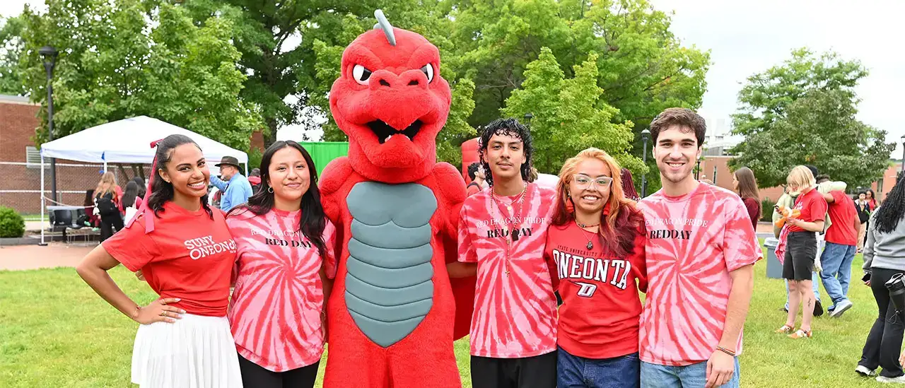 Students posing with Red