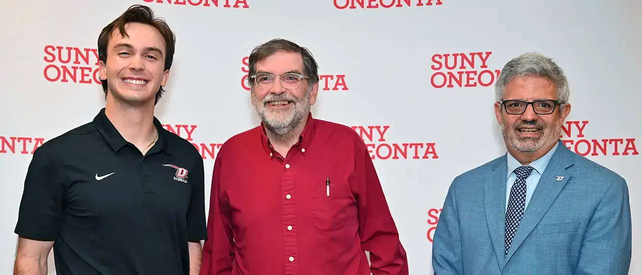 Thomas Skoczek, Dr. Allan Green, and President Cardelle at the 2024 Academic Achievement Awards ceremony