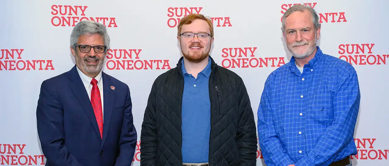 Dr. Alberto Cardelle, Andrew Lutz, and Dr. Hugh Gallager at the 2025 Academic Achievement awards ceremony