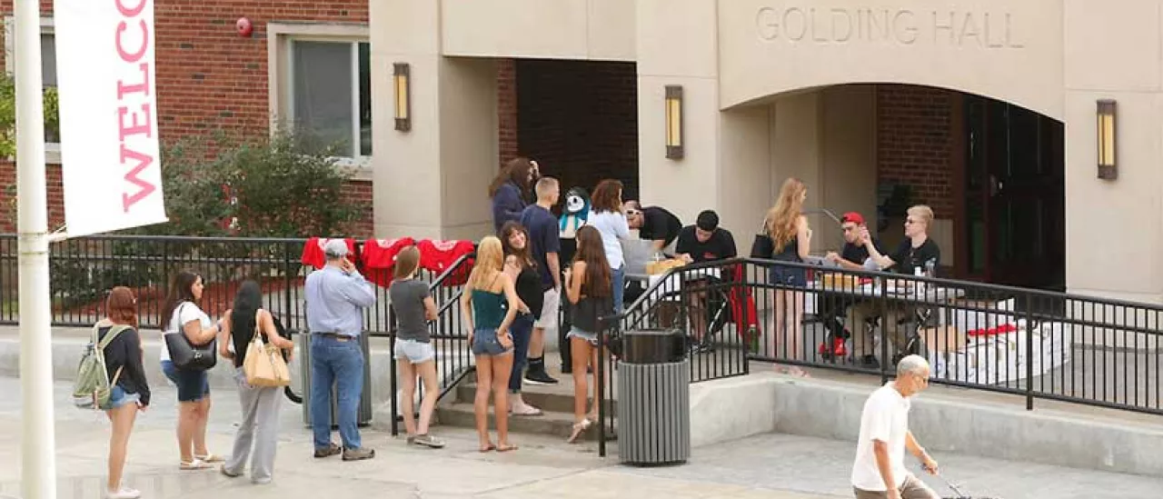 Families moving their students into their dorms.