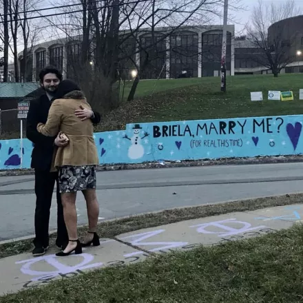 Alumnus Uses Oneonta Wall to Pop the Question