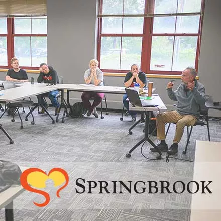 Springbrook Program Lets Staff Earn College Credits