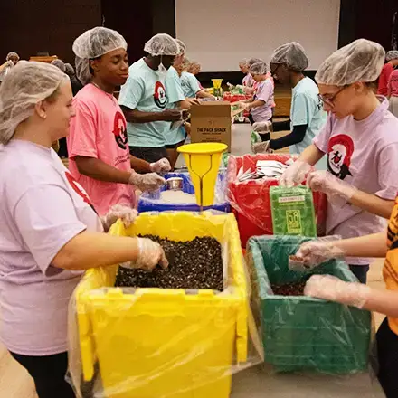 Students Pack 25,000 Meals for Community Food Banks