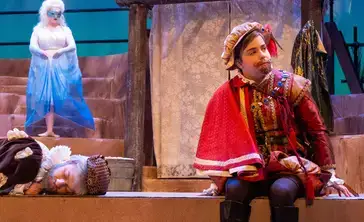 Theatre student in costume on the set of The Tempest