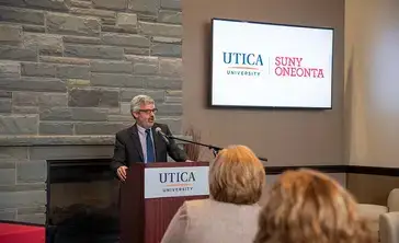 SUNY Oneonta President speaks to an audience.