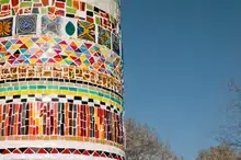 Tapestry of Diversity sculpture with mosaic tile.