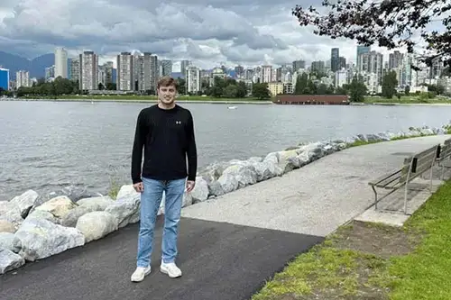 Ryan Baker with Whistler, BC skyline in the background