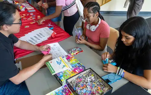 Summer Academy Students make origami birds