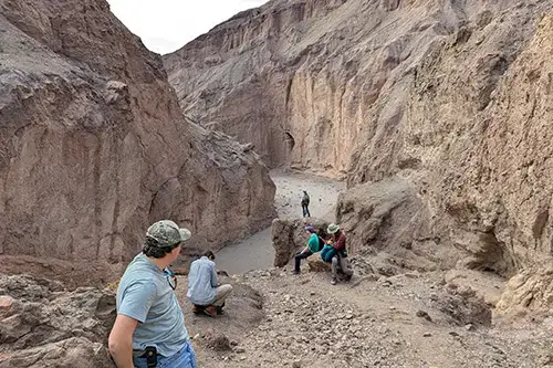 Students studying plate boundaries in the field
