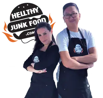 Julia Goolia and JP Lambiase wearing aprons posing together.