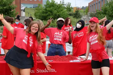 SUNY Oneonta students celebrating Red Day, a campus tradition supported by the SUNY Oneonta Foundation.