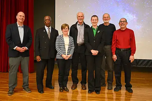 Kimmy Cushman stands with faculty and donors at the keynote luncheon at SRCA