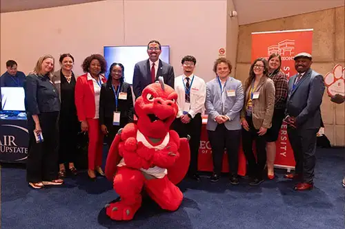 SUNY Chancellor John B King group photo with SUNY Oneonta representatives