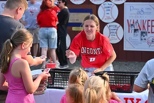suny oneonta employee hands out merch