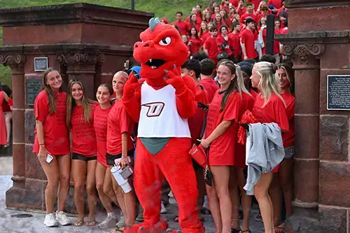 Red and Students at Pass Through the Pillars