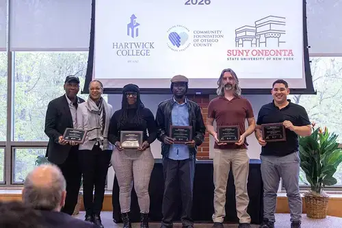 Inclusive Business Awards recipients pose for a group photo.