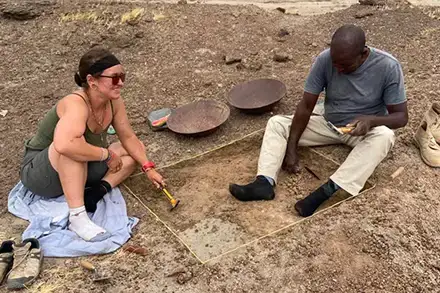 Saranna Shevalier digging fossil bovid remains