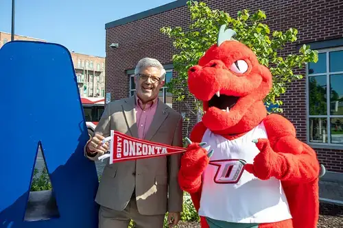 Dr. Cardelle poses with Red.