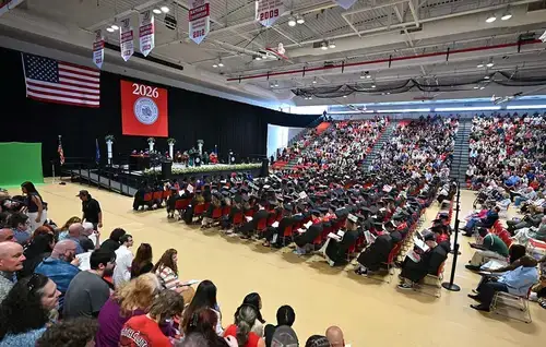Parents and friends observe commencement.