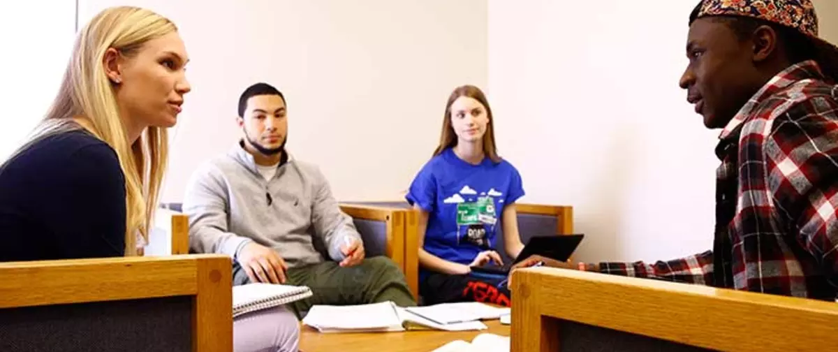 Students meeting with a counselor