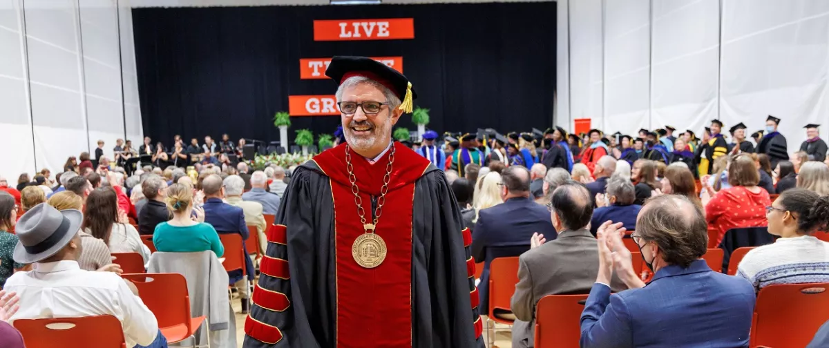 President Cardelle wearing academic regalia 