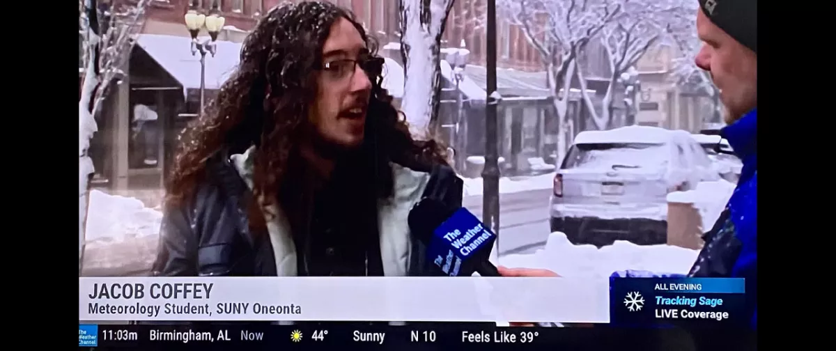 Jacob Coffey being interviewed by The Weather Channel's Justin Michaels
