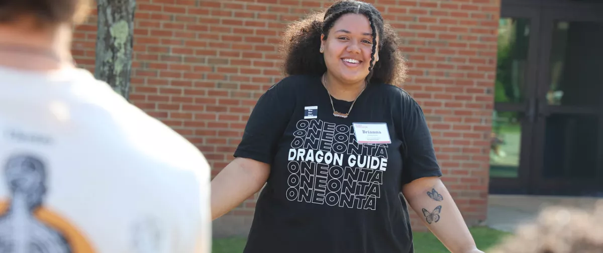 A Dragon Guide helping new students during orientation.