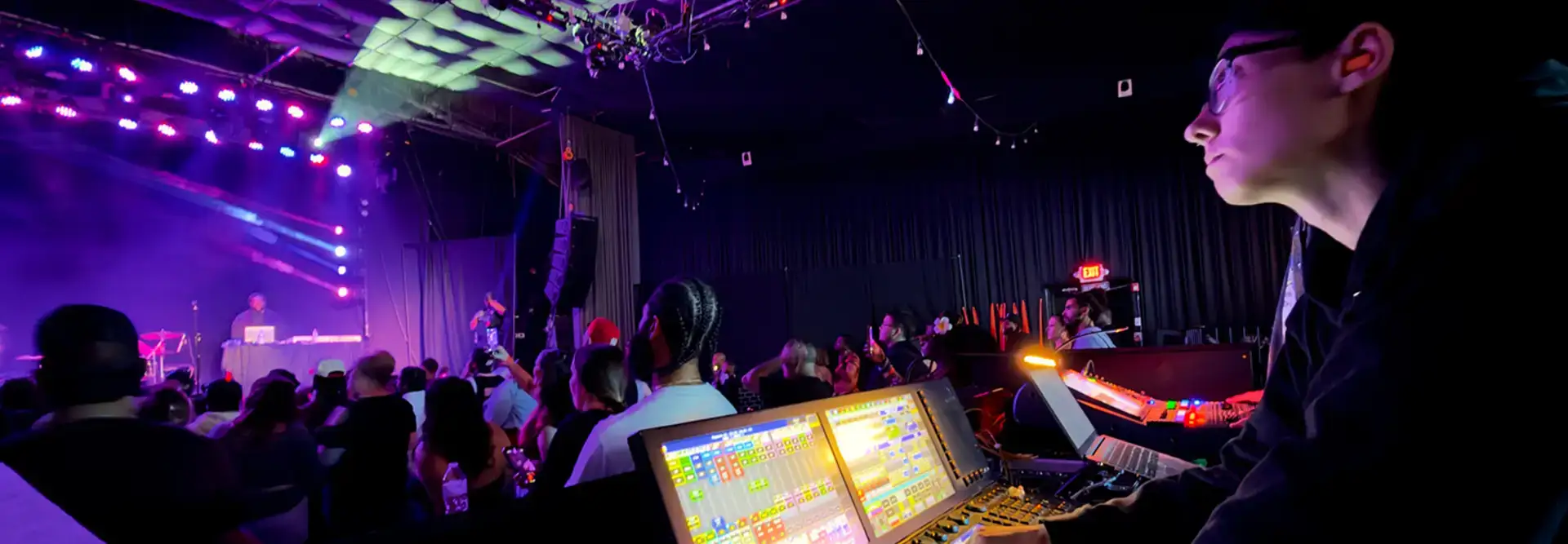 intern doing sounds at a concert