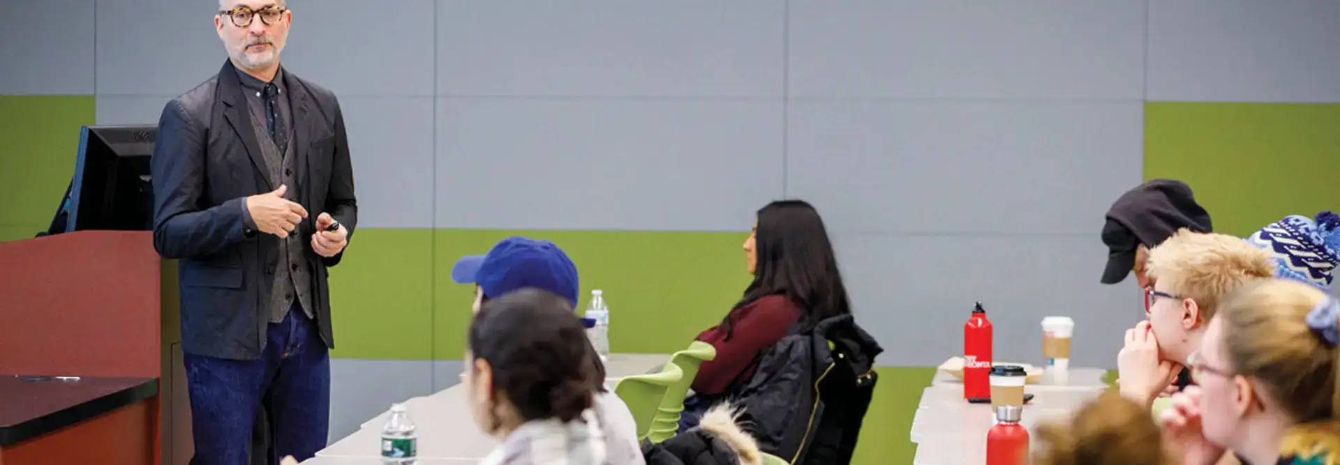 Scott Saltzman speaks to a fashion class