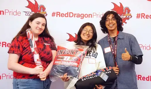 Students pose during the First-Gen Happy Hour