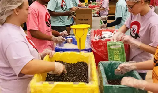 Students Pack 25,000 Meals for Community Food Banks