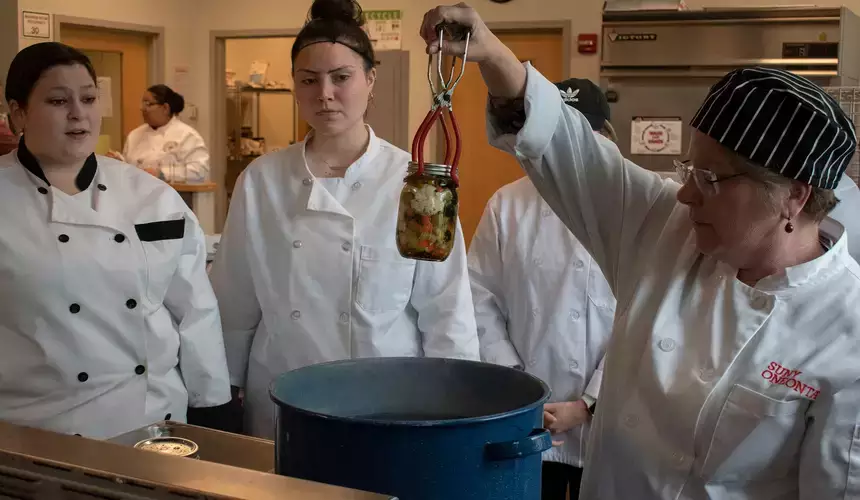Students learn nutritional cooking techniques during Food Science lab.