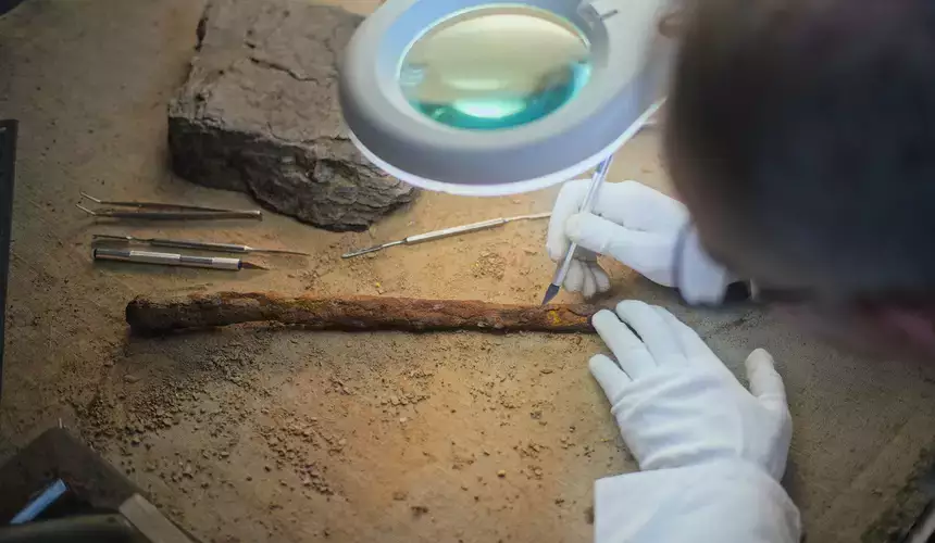 Archaeologist working in the lab