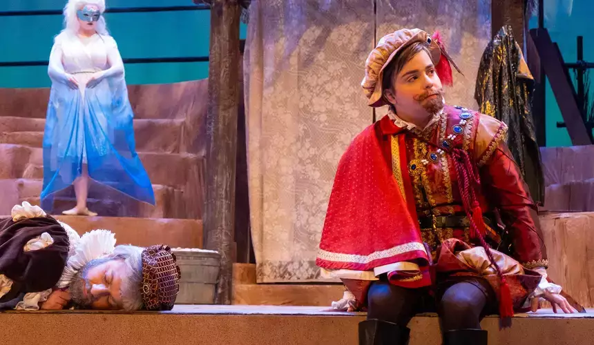 Theatre student in costume on the set of The Tempest