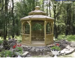 The gazebo surrounded by a beautiful garden