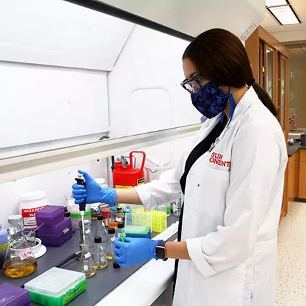 student doing research in a lab