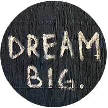 chalkboard sign "DREAM BIG."