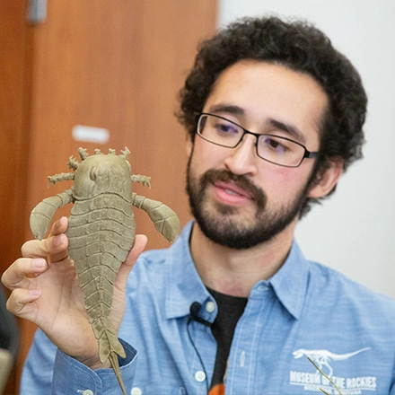 Calen Cavallaro with printed NY State official fossil