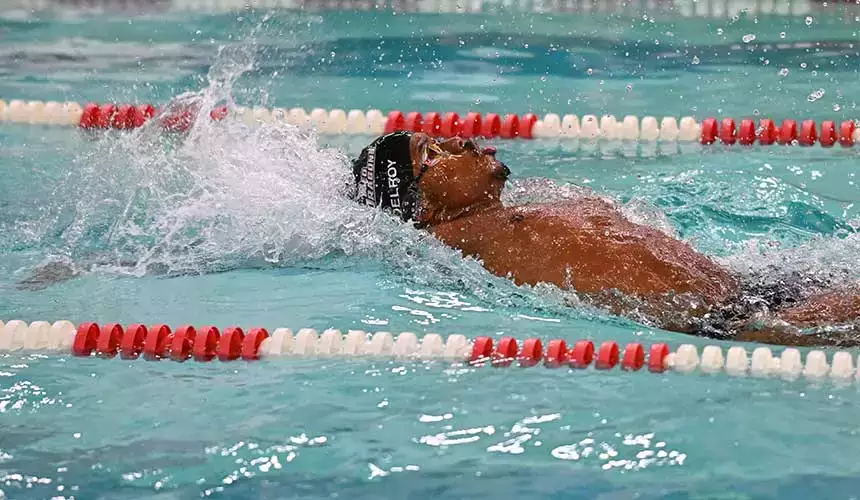 Delroy at swim meet in Chase gym