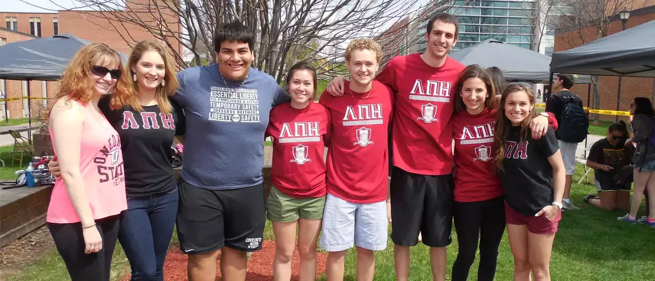 Lambda Pi Eta Students at "Fluffy Friends" event