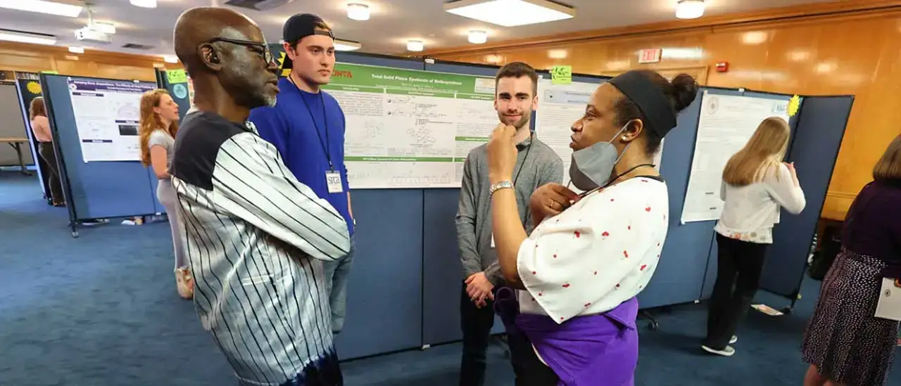 Kewulay Kamara '75 speaks with students