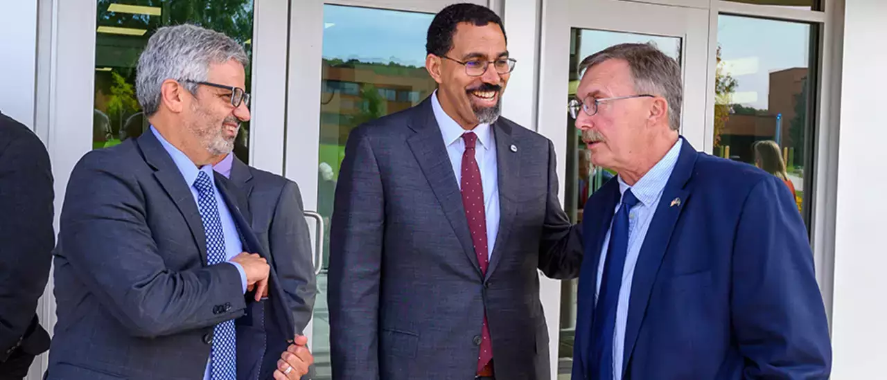 Reopening of Renovated Alumni Hall Rep Miller speaking with Dr Cardelle and Dr King Jr