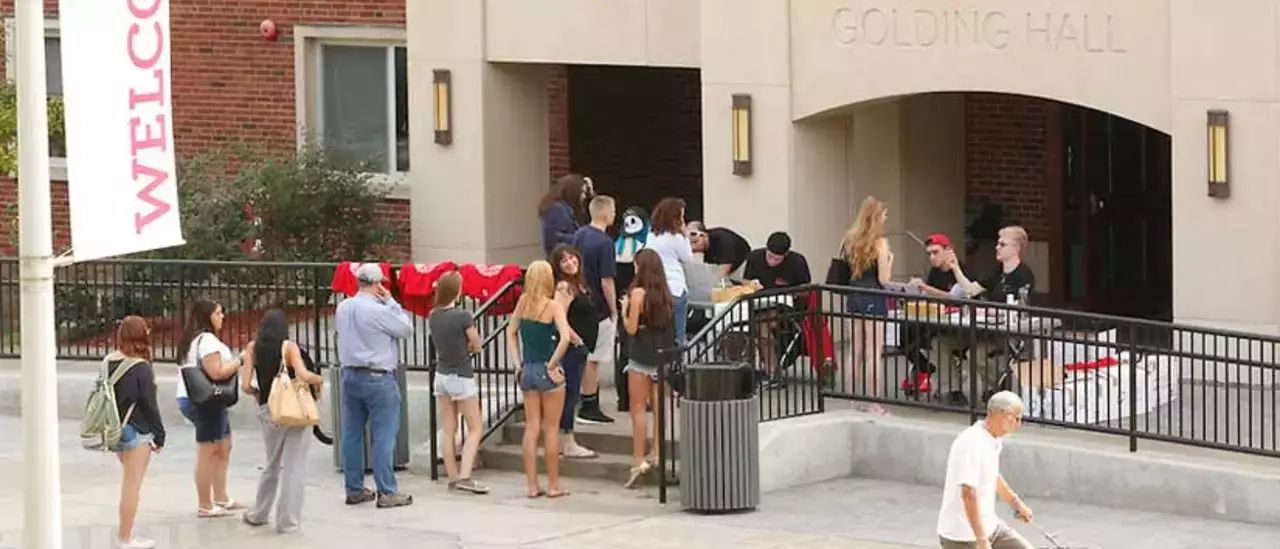Families moving their students into their dorms.