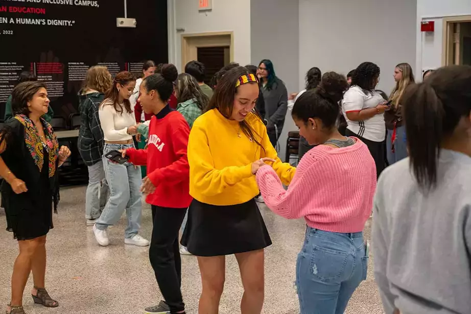 Students dance during a fiesta in the CRJIE